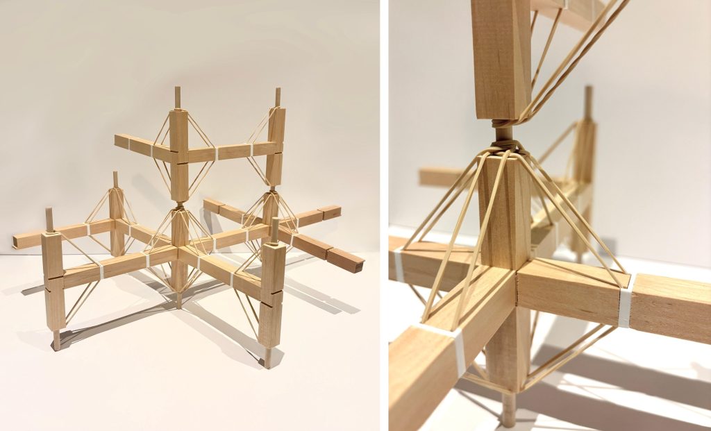 wo photographs show a pale wooden model and the elastic bands around one of its connections